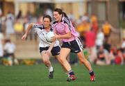 26 January 2008; Briege Corkery, Cork and 2007 All Stars, in action against Emer Flaherty, Galway and 2006 All Stars. Exhibition Game, 2006 O'Neills/TG4 Ladies GAA All Stars v 2007 O'Neills/TG4 Ladies GAA All Stars, Dubai Polo and Equestrian Club, Dubai, United Arab Emirates. Picture credit: Brendan Moran / SPORTSFILE  *** Local Caption ***