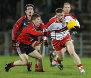 26 January 2008; Aidan McElhone, Derry, in action against Ronan Sexton, Down. Dr. McKenna Cup Final, Derry v Down, Casement Park, Belfast, Co. Antrim. Picture credit: Oliver McVeigh / SPORTSFILE