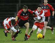 26 January 2008; Ronan Sexton, Down, in action against James Conway and Joe Keenan, Derry. Dr. McKenna Cup Final, Derry v Down, Casement Park, Belfast, Co. Antrim. Picture credit: Oliver McVeigh / SPORTSFILE