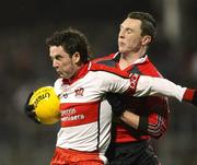 26 January 2008; Joe Keenan, Derry, in action against John Clarke, Down. Dr. McKenna Cup Final, Derry v Down, Casement Park, Belfast, Co. Antrim. Picture credit: Oliver McVeigh / SPORTSFILE