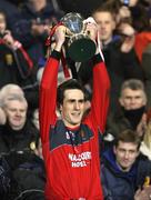 26 January 2008; Down captain Dan Gordon holds aloft the Dr. McKenna Cup. Gaelic Life, Dr. McKenna Cup Final, Derry v Down, Casement Park, Belfast, Co. Antrim. Picture credit: Oliver McVeigh / SPORTSFILE