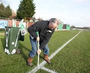 27 January 2008; Groundsman Cyril Roche, from Wexford, putting out the flags before the match. AIB All-Ireland Club Football Championship Quarter-Final, Tir Chonaill Gaels v Crossmaglen Rangers, Emerald Gaelic Grounds, Ruislip, London, England. Picture credit: Oliver McVeigh / SPORTSFILE