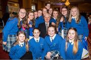 28 February 2015; Uachtarán Chumann Lúthchleas Aogán Ó Feargháil with pupils of Doire Na Ceise where is Principle before his inaugural address to the GAA Annual Congress 2015. Slieve Russell Hotel, Cavan. Picture credit: Ray McManus / SPORTSFILE