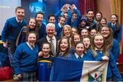 28 February 2015; Uachtarán Chumann Lúthchleas Aogán Ó Feargháil with his wife Frances and pupils from the Dernakesh National School, Maudabawn, Cootehill, Co. Cavan, after his inaugural address to the GAA Annual Congress 2015. Slieve Russell Hotel, Cavan. Picture credit: Ray McManus / SPORTSFILE