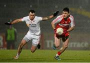 28 February 2015; Eoin Bradley, Derry, in action against Cathal McCarron, Tyrone. Allianz Football League, Division 1, Round 3, Tyrone v Derry. Healy Park, Omagh, Co. Tyrone. Picture credit: Oliver McVeigh / SPORTSFILE