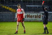 28 February 2015; Niall Holly, Derry, receives a Red card for a second half incident. Allianz Football League, Division 1, Round 3, Tyrone v Derry. Healy Park, Omagh, Co. Tyrone. Picture credit: Oliver McVeigh / SPORTSFILE