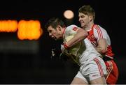 28 February 2015; Sean Cavanagh, Tyrone, in action against Niall Holly, Derry. Allianz Football League, Division 1, Round 3, Tyrone v Derry. Healy Park, Omagh, Co. Tyrone. Picture credit: Oliver McVeigh / SPORTSFILE
