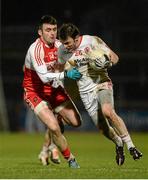 28 February 2015; Barry Tierney, Tyrone, in action against Eoin Bradley, Derry. Allianz Football League, Division 1, Round 3, Tyrone v Derry. Healy Park, Omagh, Co. Tyrone. Picture credit: Oliver McVeigh / SPORTSFILE