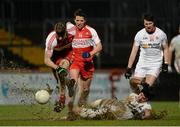 28 February 2015; Mattie Donnelly, Tyrone, in action against Niall Holly, Derry. Allianz Football League, Division 1, Round 3, Tyrone v Derry. Healy Park, Omagh, Co. Tyrone. Picture credit: Oliver McVeigh / SPORTSFILE