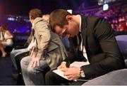 28 February 2015; WBA Super-Bantamweight Champion Scott Quigg signs an autograph for a fan. The World Is Not Enough Undercard, Odyssey Arena, Belfast, Co. Antrim. Picture credit: Ramsey Cardy / SPORTSFILE