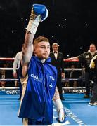 28 February 2015; IBF Super-Bantamweight world title holder Carl Frampton is announced to the crowd ahead of his title fight against challenger Chris Avalos. The World is Not Enough, Odyssey Arena, Belfast, Co. Antrim. Picture credit: Ramsey Cardy / SPORTSFILE