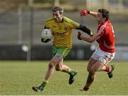1 March 2015; Christy Toye, Donegal, in action against Mark Collins, Cork. Allianz Football League, Division 1, Round 3, Donegal v Cork. Fr Tierney Park, Ballyshannon, Co. Donegal. Picture credit: Oliver McVeigh / SPORTSFILE