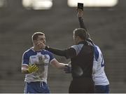 1 March 2015; Referee Rory Hickey, shows the black card to Dermot Malone, left , Monaghan. Allianz Football League, Division 1, Round 3, Mayo v Monaghan. Elverys MacHale Park, Castlebar, Co. Mayo. Picture credit: David Maher / SPORTSFILE