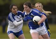1 March 2015; Laura Peake, Laois, in action against Cathriona McConnell, Monaghan. TESCO HomeGrown Ladies National Football League Division 1 Round 4, Laois v Monaghan, Crettyard GAA club, Crettyard, Co. Laois. Picture credit: Pat Murphy / SPORTSFILE