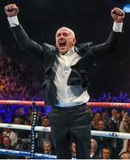 28 February 2015; Barry McGuigan, manager of Carl Frampton, celebrates his fighter's victory over Chris Avalos during their IBF Super-Bantamweight World Title fight. The World is Not Enough, Odyssey Arena, Belfast, Co. Antrim. Picture credit: Ramsey Cardy / SPORTSFILE