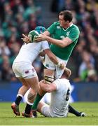 1 March 2015; Devin Toner, Ireland, is tackled by Jack Nowell, left, and George Kruis, England. RBS Six Nations Rugby Championship, Ireland v England. Aviva Stadium, Lansdowne Road, Dublin. Picture credit: Stephen McCarthy / SPORTSFILE