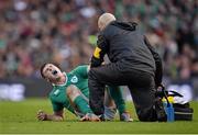 1 March 2015; Robbie Henshaw, Ireland, is tended to by Dr. Eanna Falvey, Ireland team doctor. RBS Six Nations Rugby Championship, Ireland v England. Aviva Stadium, Lansdowne Road, Dublin. Picture credit: Brendan Moran / SPORTSFILE