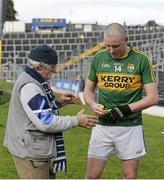 1 March 2015; Kerry's Kieran Donaghy gives his gloves to Gerry Gowran, from Drumcondra, Dublin, after the game. Allianz Football League, Division 1, Round 3, Kerry v Dublin. Fitzgerald Stadium, Killarney, Co. Kerry. Picture credit: Diarmuid Greene / SPORTSFILE