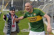 1 March 2015; Kerry's Kieran Donaghy with Gerry Gowran, from Drumcondra, Dublin, after he gave him his gloves after the game. Allianz Football League, Division 1, Round 3, Kerry v Dublin. Fitzgerald Stadium, Killarney, Co. Kerry. Picture credit: Diarmuid Greene / SPORTSFILE