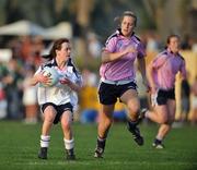 26 January 2008; Dympna O'Brien, Limerick and 2006 All Stars, in action against brid Stack, Cork and 2007 All Stars. Exhibition Game, 2006 O'Neills/TG4 Ladies GAA All Stars v 2007 O'Neills/TG4 Ladies GAA All Stars, Dubai Polo and Equestrian Club, Dubai, United Arab Emirates. Picture credit: Brendan Moran / SPORTSFILE  *** Local Caption ***