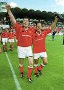 6 May 2000; Anthony Foley, left, and Mike Mullins of Munster celebrate following their side's victory during the Heineken Cup Semi-Final match between Toulouse and Munster at the Stade du Parc Lescure in Bordeaux, France. Photo by Brendan Moran/Sportsfile