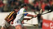 12 March 2000; Anthony Kirwan of Waterford in action against Noel Hickey of Kilkenny during the Church & General National Hurling League Division 1B match between Kilkenny and Waterford at Nowlan Park in Kilkenny. Photo by Ray McManus/Sportsfile