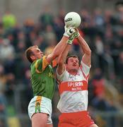 20 May 2000; John McDermott of Meath in action against Anthony Tohill of Derry during the Church & General National Football League Final Replay match between Derry and Meath at St Tiernach's Park in Clones, Monaghan. Photo by Aoife Rice/Sportsfile
