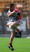 7 May 2000; Louth goalkeepper Colm Nally, left, and Stephen Melia celebrate following their side's victory during the Church & General National Football League Division 2 Final match between Louth and Offaly at Croke Park in Dublin. Photo by Brendan Moran/Sportsfile