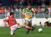 7 May 2000; Colm Quinn of Offaly in action against JP Rooney of Louth during the Church & General National Football League Division 2 Final match between Louth and Offaly at Croke Park in Dublin. Photo by Ray McManus/Sportsfile