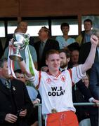 13 May 2000; Tyrone captain Cormac McAnallen lifts the Tadhg O'Cleirigh Cup following his side's victory during the All-Ireland U21 Football Championship Final match between Tyrone and Limerick at Cusack Park in Mullingar, Westmeath. Photo by Damien Eagers/Sportsfile
