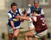 7 May 2000; Cyril Cuddy of Laois in action against Martin Williams of Westmeath during the Guinness Leinster Senior Hurling Championship Round Robin match between Westmeath and Laois at Cusack Park in Mullingar, Westmeath. Photo by Damien Eagers/Sportsfile