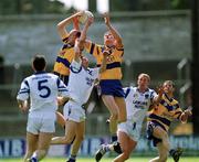 14 May 2000; Donal O'Sullivan, left, and David Russell of Clare in action against Aidan Ahearne of Waterford during the Bank of Ireland Munster Senior Football Championship Quarter-Final match between Clare and Waterford at Cusack Park in Ennis, Clare. Photo by Ray McManus/Sportsfile