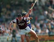 7 May 2000; David Cuddy of Laois in action against Darren McCormack of Westmeath during the Guinness Leinster Senior Hurling Championship Round Robin match between Westmeath and Laois at Cusack Park in Mullingar, Westmeath. Photo by Damien Eagers/Sportsfile