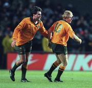 23 November 1996; David Knox of Australia, right, is congratulated by team-mate Daniel Herbert, after scoring his side's try during the Autumn International match between Ireland and Australia at Lansdowne Road in Dublin. Photo by Brendan Moran/Sportsfile