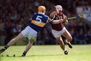14 May 2000; David Tierney of Galway in action against Paul Ormonde of Tipperary during the Church & General National Hurling League Final match between Tipperary and Galway at the Gaelic Grounds in Limerick. Photo by Brendan Moran/Sportsfile