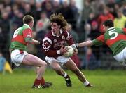 15 April 2000; David Tierney of Galway in action against Alan Moran and Niall Dunne of Mayo during the Connacht GAA Football U21 Championship Final match between Galway and Mayo at St Jarlath's Park in Tuam, Galway. Photo by Sportsfile