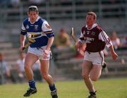 7 May 2000; Declan Rooney of Laois in action against Brendan Williams of Westmeath during the Guinness Leinster Senior Hurling Championship Round Robin match between Westmeath and Laois at Cusack Park in Mullingar, Westmeath. Photo by Damien Eagers/Sportsfile