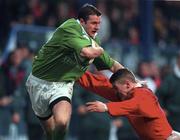31 March 2000; Geordan Murphy of Ireland is tackled by Delme Williams of Wales during the Six Nations A Rugby Championship match between Ireland and Wales at Donnybrook Stadium in Dublin. Photo by Aoife Rice/Sportsfile