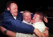 5 May 2000; Shelbourne manager Dermot Keely, centre, celebrates with assistant manager Alan Mattews, left, following their side's victory during the FAI Cup Final Replay match between Shelbourne and Bohemians at Dalymount Park in Dublin. Photo by Damien Eagers/Sportsfile