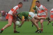 20 May 2000; Niall McOskar of Derry in action against Mark O'Reilly of Meath during the Church & General National Football League Final Replay match between Derry and Meath at St Tiernach's Park in Clones, Monaghan. Photo by David Maher/Sportsfile