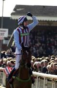 15 March 2000; Jockey AP McCoy celebrates after winning the Queen Mother Champion Chase on Edredon Bleu during Day Two of the Cheltenham Racing Festival at Prestbury Park in Cheltenham, England. Photo by Ray Lohan/Sportsfile