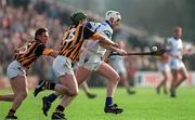 12 March 2000; Fergal Hartley of Waterford in action against Henry Shefflin, centre, and Charlie Carter of Kilkenny during the Church & General National Hurling League Division 1B match between Kilkenny and Waterford at Nowlan Park in Kilkenny. Photo by Ray McManus/Sportsfile