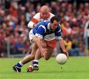 20 June 1999; Gavin Hartin of Cavan in action against Geoffrey McGonagle of Derry during the Bank of Ireland Ulster Senior Football Championship Quarter-Final match between Cavan and Derry at Breffni Park in Cavan. Photo by Damien Eagers/Sportsfile