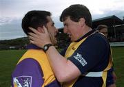 20 May 2000; Scott Doran of Wexford is congratulated by manager Ger Halligan following their side's victory during the Bank of Ireland Leinster Senior Football Championship Group Stage Round 3 match between Wicklow and Wexford at Aughrim County Ground in Aughrim, Wicklow. Photo by Matt Browne/Sportsfile