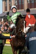 5 May 2000; Jockey Charlie Swan celebrates after winning the Shell Champion Hurdle on Grimes at Punchestown Racecourse in Kildare. Photo by Matt Browne/Sportsfile