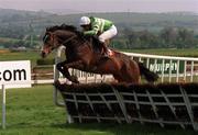 5 May 2000; Grimes, with Charlie Swan, up jumps the last on their way to winning the Shell Champion Hurdle at Punchestown Racecourse in Kildare. Photo by Matt Browne/Sportsfile