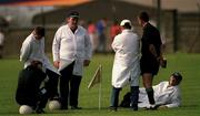 7 May 2000; Referee Seamus McCormack, second right, and umpires relax on the pitch during half-time of the Bank of Ireland Leinster Senior Football Championship Group Stage Round 1 match between Wexford and Longford at O'Kennedy Park in New Ross, Wexford. Photo by Aoife Rice/Sportsfile