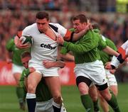 15 February 1997; Jonathan Sleightholme of England is tackled by Maurice Field and James Topping of Ireland during the Five Nations Rugby Championship match between Ireland and England at Lansdowne Road in Dublin. Photo by David Maher/Sportsfile