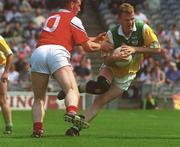 7 May 2000; James Brady of Offaly in action against Mark Stanfield of Louth during the Church & General National Football League Division 2 Final match between Louth and Offaly at Croke Park in Dublin. Photo by Ray Lohan/Sportsfile