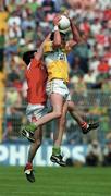 7 May 2000; James Grennan of Offaly in action against Paddy McGuigan of Louth during the Church & General National Football League Division 2 Final match between Louth and Offaly at Croke Park in Dublin. Photo by Brendan Moran/Sportsfile